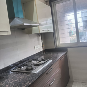 Kitchen in 2 BHK Apartment at Alhad CHS Dadar, Bhavani Shankar Road – for Rent