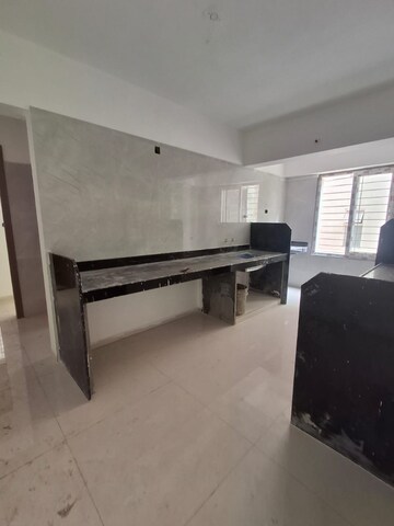 Kitchen in 2 BHK Apartment at Sun City – for Sale