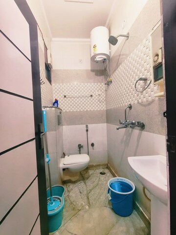 Bathroom in 3 BHK Builder Floor at Dwarka Mor – for Rent
