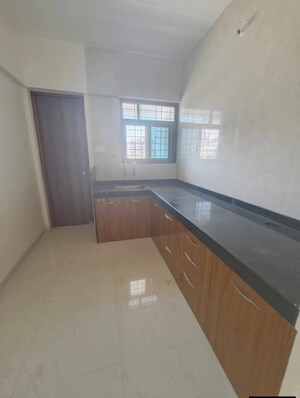 Kitchen in 2 BHK Apartment at Brahma Park, Wakad – for Rent