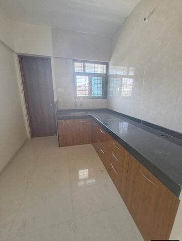 Kitchen in 2 BHK Apartment at Brahma Park, Wakad – for Rent