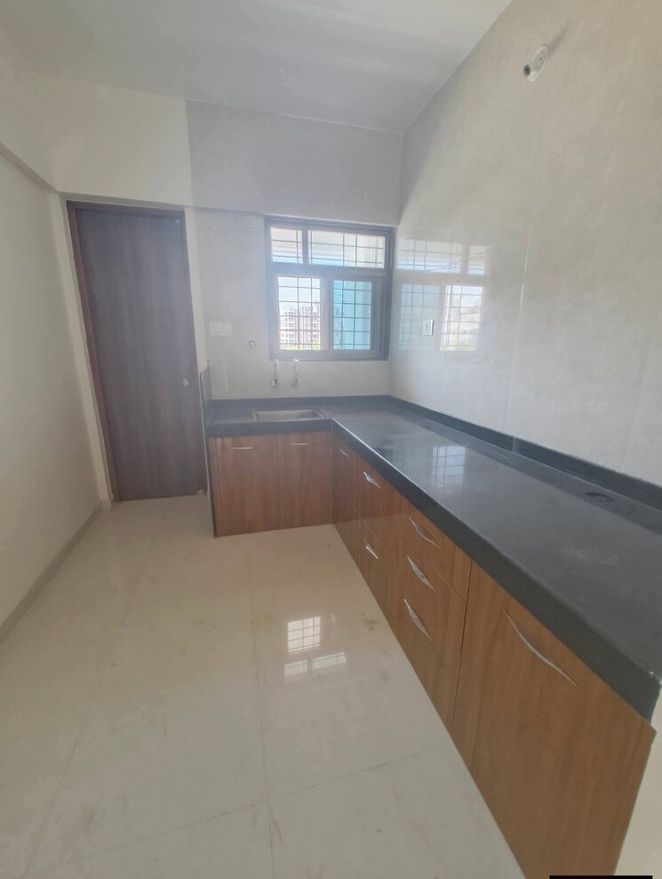 Kitchen, brahma-park 2 Bedroom 760 Sq.Ft. Apartment In Wakad Pune 9705981