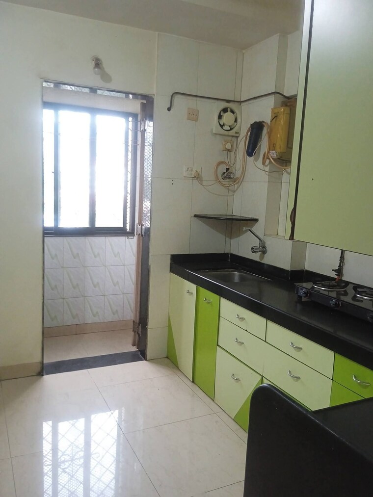 Kitchen, satellite-garden 2 Bedroom 950 Sq.Ft. Apartment In Goregaon East Mumbai 9706053