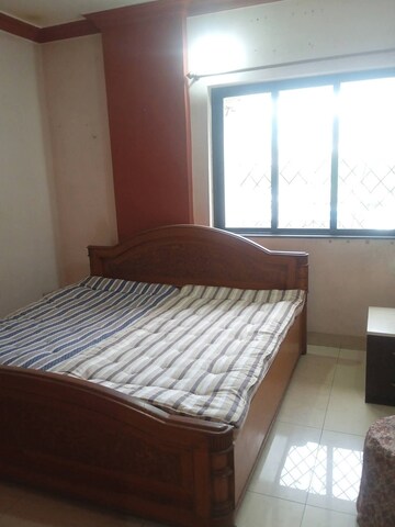 Bedroom in 2 BHK Apartment at Satellite Garden, Goregaon East – for Rent