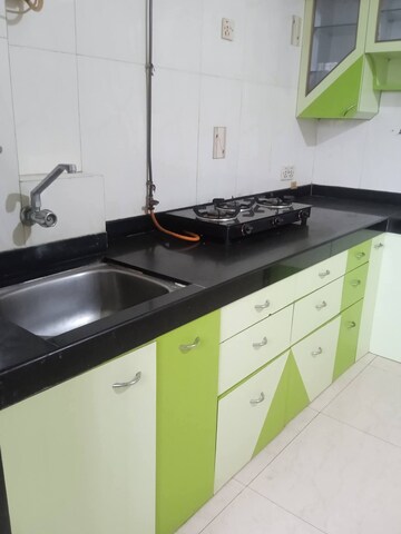 Kitchen in 2 BHK Apartment at Satellite Garden, Goregaon East – for Rent