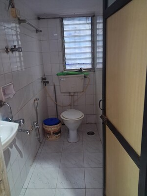 Bathroom in 1 RK Apartment at Jinal Chs, Kandivali East – for Rent