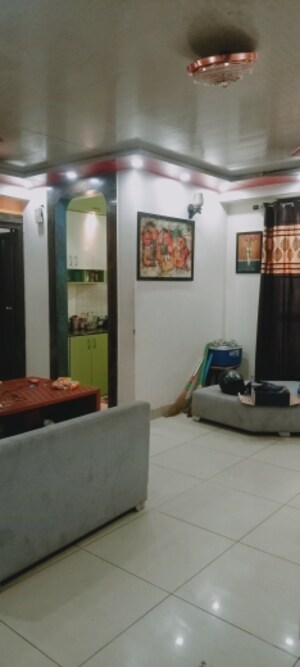 Living Room in 2 BHK Apartment at River Heights Plaza, Raj Nagar Extension – for Rent