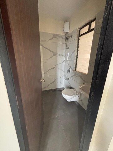 Bathroom in 2 BHK Apartment at Shri Yashoda Vinayak Sankul, Kalyan West – for Sale
