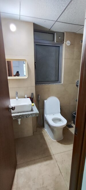 Bathroom in 2 BHK Apartment at Kalpataru Immensa, Kolshet Road – for Rent