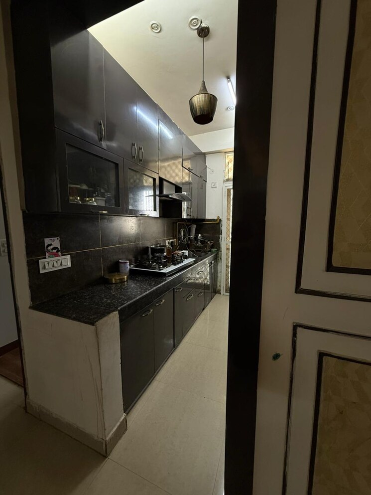 Kitchen, charms-solitaire-ghaziabad 2.5 Bedroom 1550 Sq.Ft. Apartment In Ahinsa Khand 2 Ghaziabad 9706522