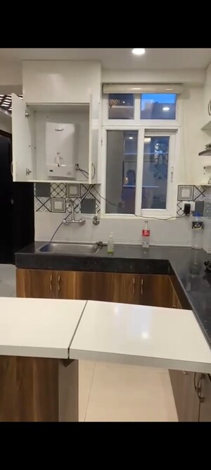 Kitchen in 2 BHK Apartment at Signature The Serenas, Sohna Sector 36 – for Rent