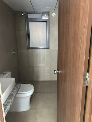 Bathroom in 2 BHK Apartment at Kalpataru Immensa, Kolshet Road – for Rent