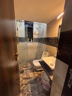 Living Room in 2 BHK Apartment at Raheja Township, Malad East – for Rent