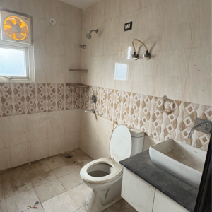 Bathroom in 3 BHK Apartment at Oxirich Avenue, Ahinsa Khand 2 – for Rent