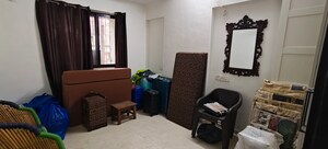 Living Room in 2 BHK Apartment at Sumeru CHS, Andheri West – for Rent