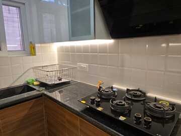 Kitchen in 3 BHK Apartment at Maxxus Elanza, International Airport Road – for Sale