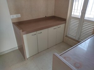 Kitchen in 1.5 BHK Apartment at Dosti West County, Balkum Pada – for Sale