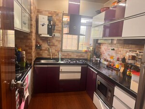 Kitchen in 2 BHK Apartment at Swastik Residency 1, Ghodbunder Road – for Sale