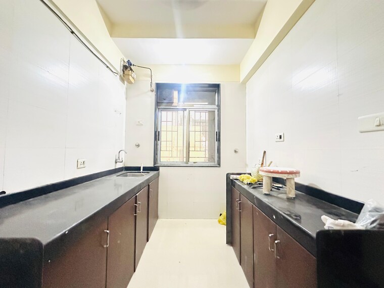 Kitchen, sheth-vasant-athena 3 Bedroom 900 Sq.Ft. Apartment In Laxmi Nagar Thane 9707235