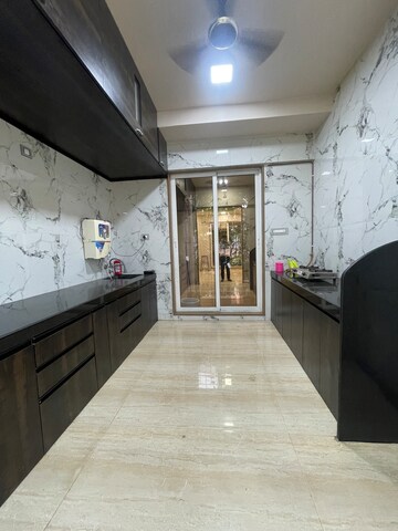 Kitchen in 4 BHK Apartment at Rashmi Signature, Mira Road – for Rent