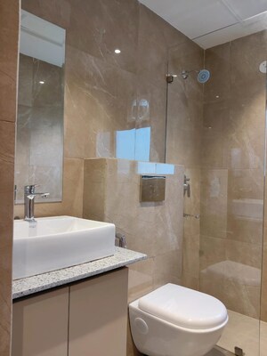 Bathroom in 3 BHK Apartment at Suncity Vatsal Valley, Gwal Pahari – for Sale