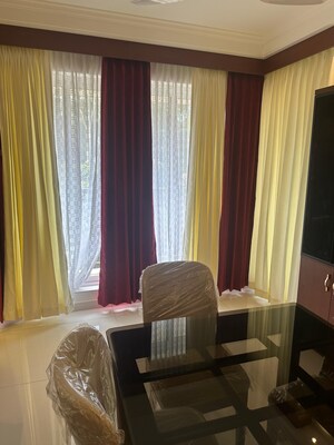 Living Room in 4 BHK Apartment at Avenue Road – for Sale