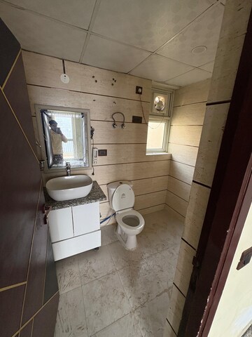 Bathroom in 3 BHK Apartment at Piedmont Taksila Heights, Sector 37c – for Rent