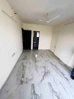 Building Lobby in 2 BHK Apartment at JP Eminence, Andheri West – for Rent