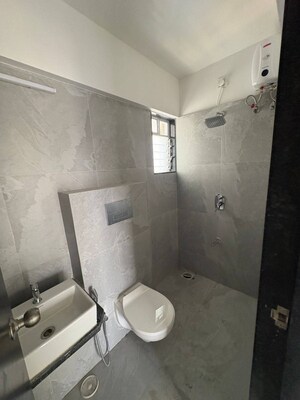 Bathroom in 2 BHK Apartment at JP Eminence, Andheri West – for Rent