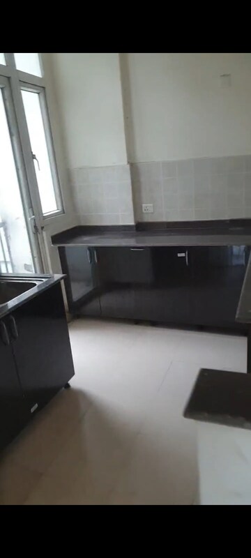 Kitchen in 3 BHK Apartment at Amrapali Platinum, Sector 119 – for Sale