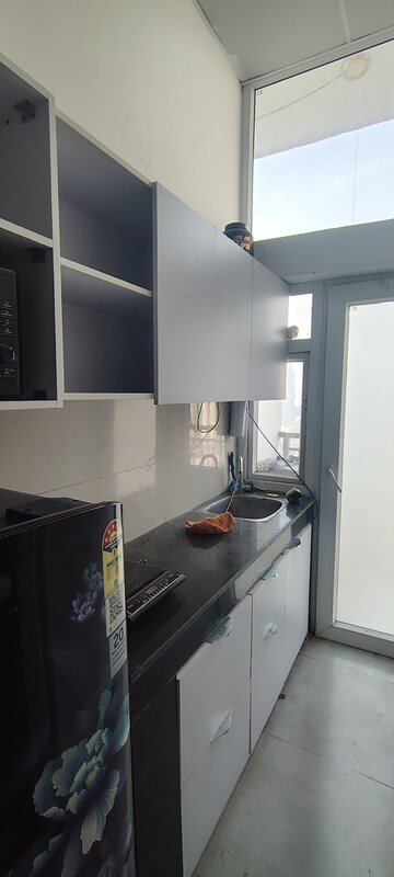Kitchen in 1 BHK Apartment at DAH Greentech NX One, Tech Zone 4 Greater Noida – for Rent