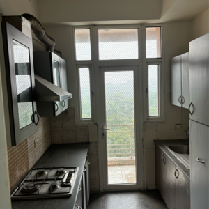 Kitchen in 3 BHK Apartment at Mahagun Maple, Sector 51 – for Sale