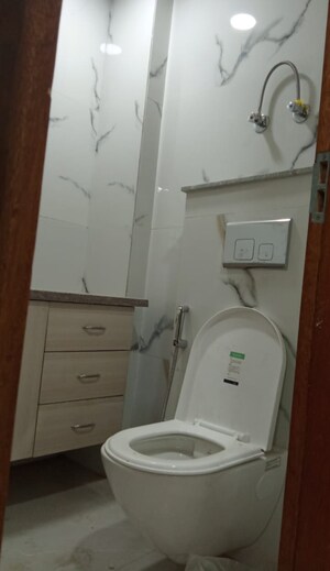 Bathroom in 4 BHK Builder Floor at Freedom Fighters Enclave – for Sale