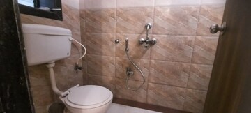 Bathroom in 2 BHK Apartment at Oshiwara Mhada, Andheri West – for Rent