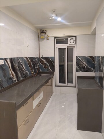Kitchen in 2 BHK Apartment at Gurukrupa Nigam, Ghatkopar East – for Rent