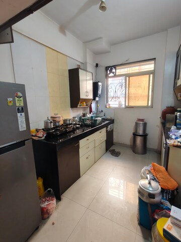 Kitchen in 2 BHK Apartment at Motiram Royal Park, Ambernath East – for Rent