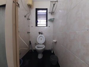 Bathroom in 2 BHK Apartment at Velentine Tower, Goregaon East – for Rent