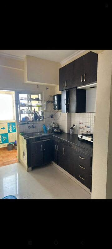 Kitchen in 1 RK Apartment at Antriksh Golf View, Sector 78 – for Rent