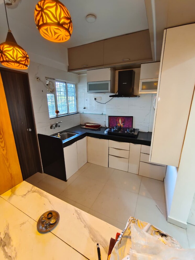 Kitchen, geeta-gold-floristaa 2 Bedroom 1000 Sq.Ft. Apartment In Kharadi Pune 9711026