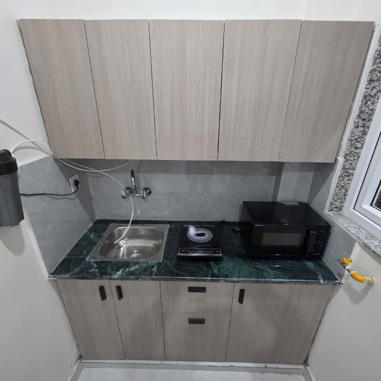 Kitchen, sector 56 1 RK 350 Sq.Ft. Apartment In Sector 56 Gurgaon 9711434