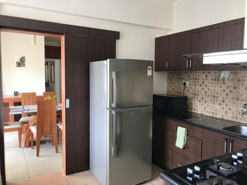 Kitchen in 2 BHK Apartment at Godrej Woodsman Estate, Hebbal – for Rent