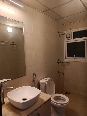 Bathroom in 2 BHK Apartment at Bhartiya Nikoo Homes, Thanisandra Main Road – for Rent