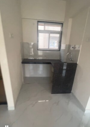 Kitchen in 1 BHK Apartment at Ace Courtyard, Ghodbunder Road – for Rent