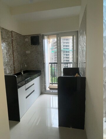 Kitchen in 1 BHK Apartment at Raunak Residency Thane, Pokhran Road No One – for Rent