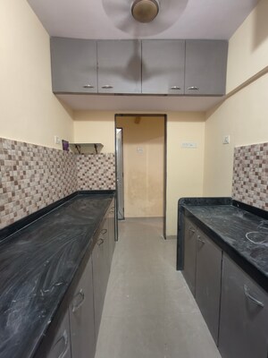 Kitchen in 1 BHK Apartment at Hubtown Greenwoods, Vartak Nagar – for Rent