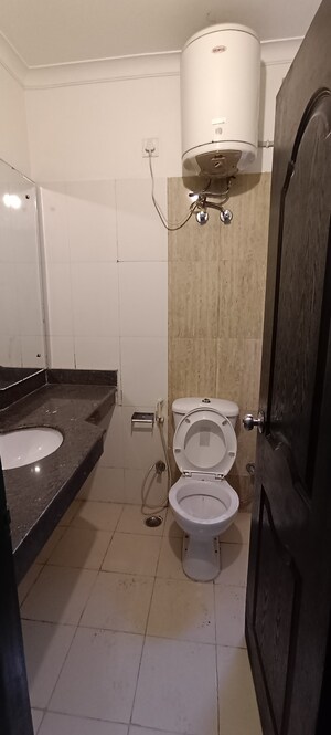 Bathroom in 3.5 BHK Apartment at Ansal API Esencia, Sector 67 – for Rent