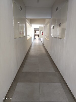 Building Lobby in 1 BHK Apartment at Paranjape Forest Trails The Highlands, Bhugaon – for Rent