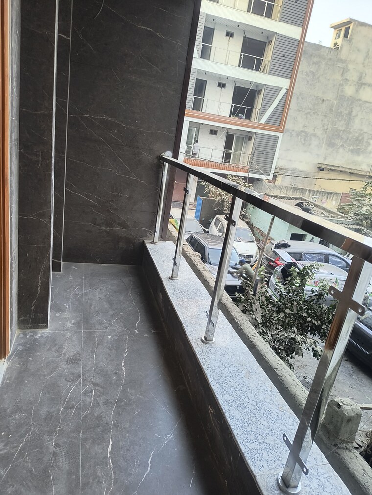 Balcony, dwarka mor 2 Bedroom 60 Sq.Yd. Builder Floor In Dwarka Mor Delhi 9712446