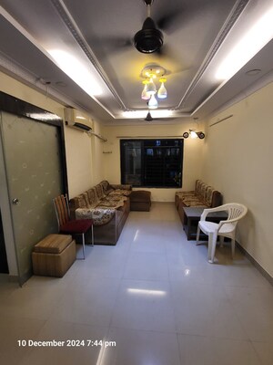 Living Room in 1 BHK Apartment at Sheth Vasant Marvel, Borivali East – for Rent