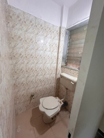 Bathroom in 2 BHK Apartment at Evershine Tower, Kandivali East – for Rent